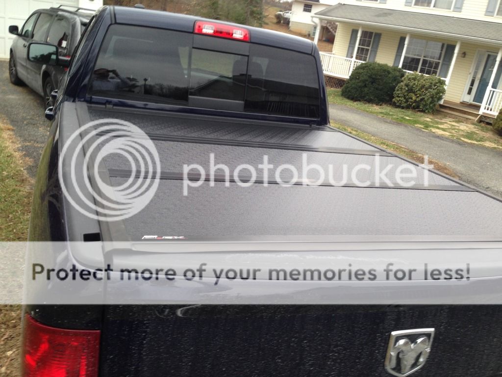 Install tonneau cover w/drop in bedliner...might do a sprayin bed